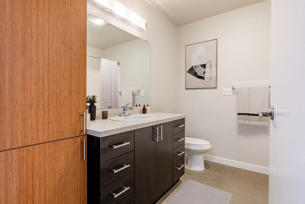 bathroom features washer and dryer in unit