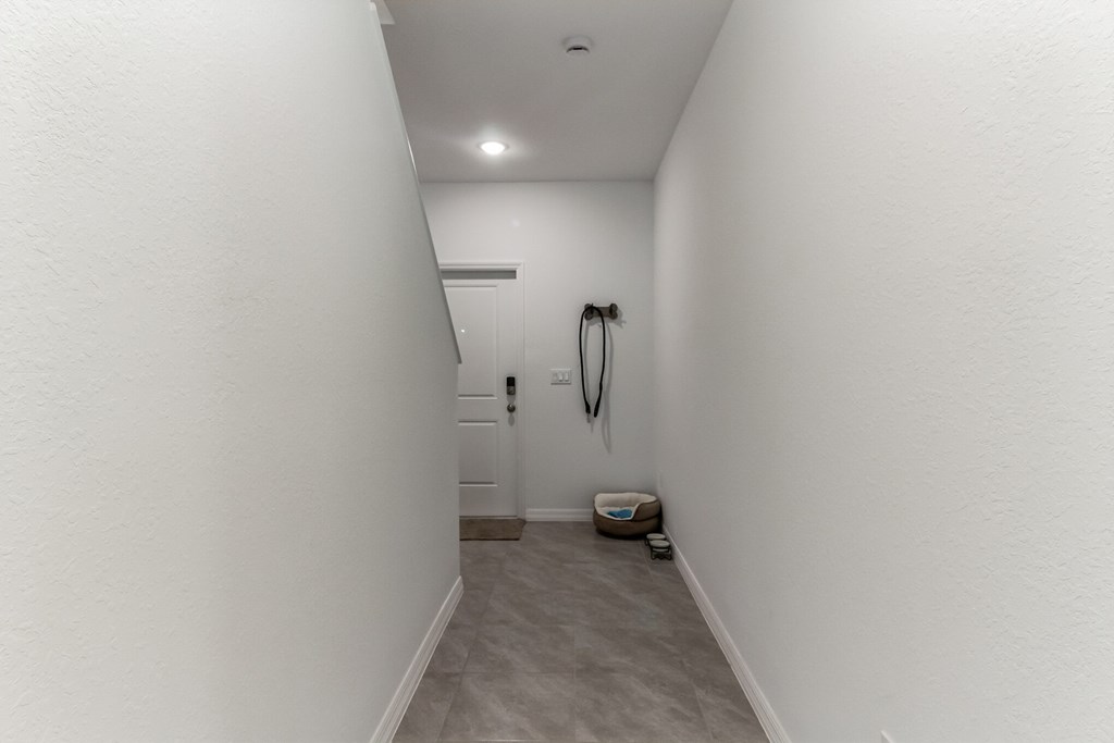 Boatman Hammock Townhomes in Lake Worth, FL photo of a bathroom with a shower and a toilet in a white room