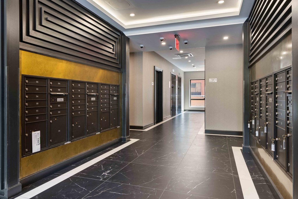 a view of the lobby of a building with lockers