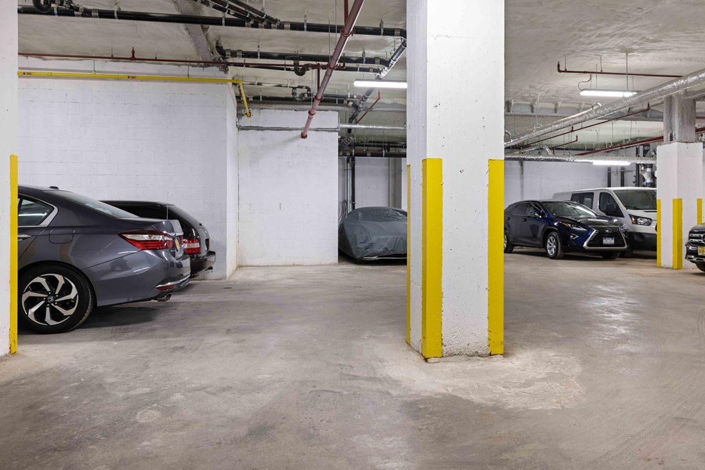 a parking garage with cars parked in it
