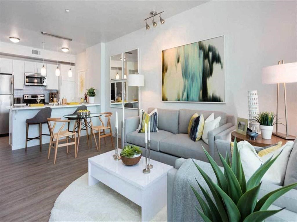 a living room with a couch and a table