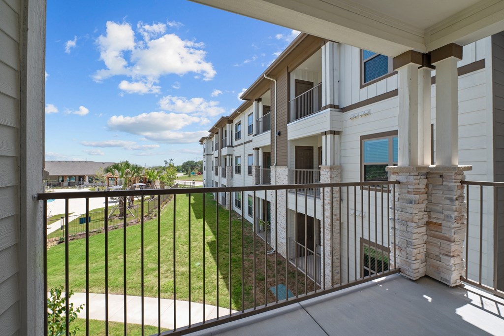 the preserve at ballantyne commons balcony view of apartment buildings