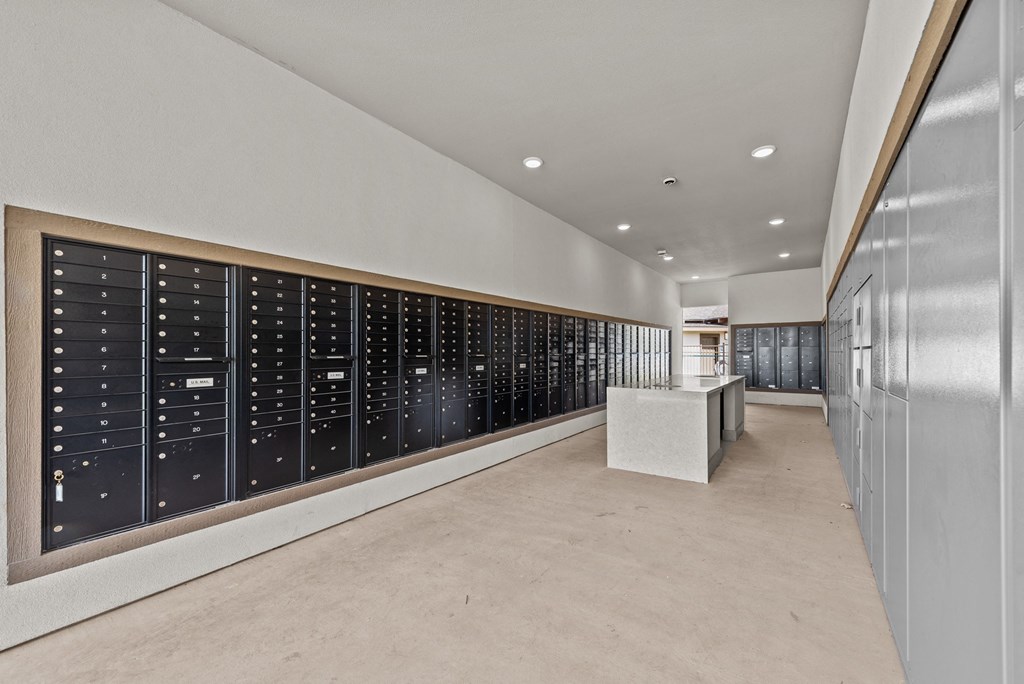 a large storage room with a large closet filled with refrigerators