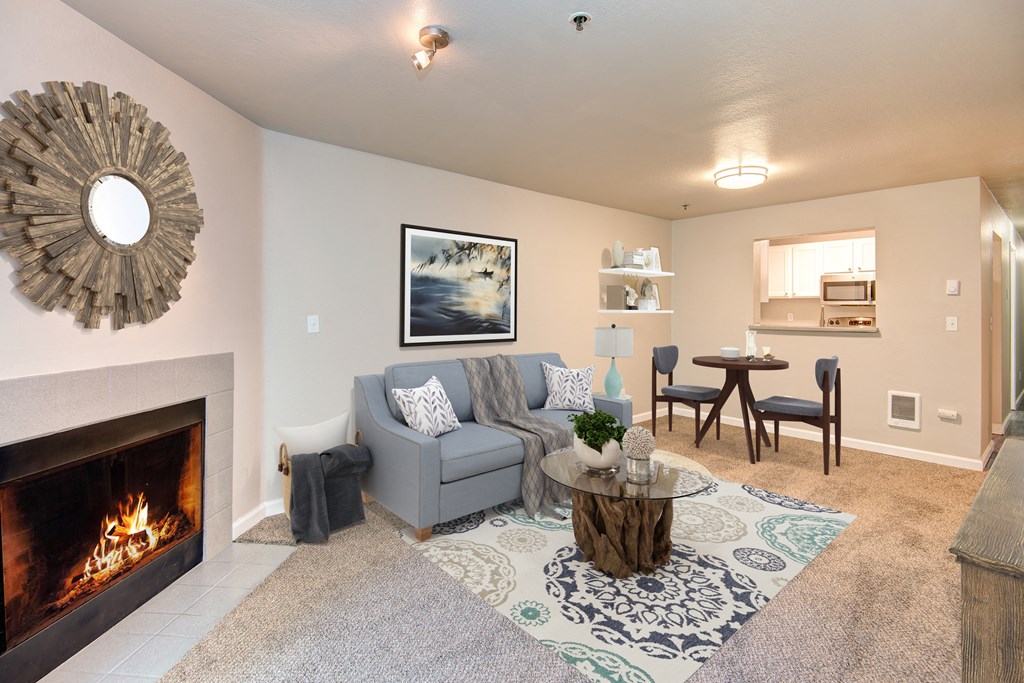 a living room with a fireplace and a couch