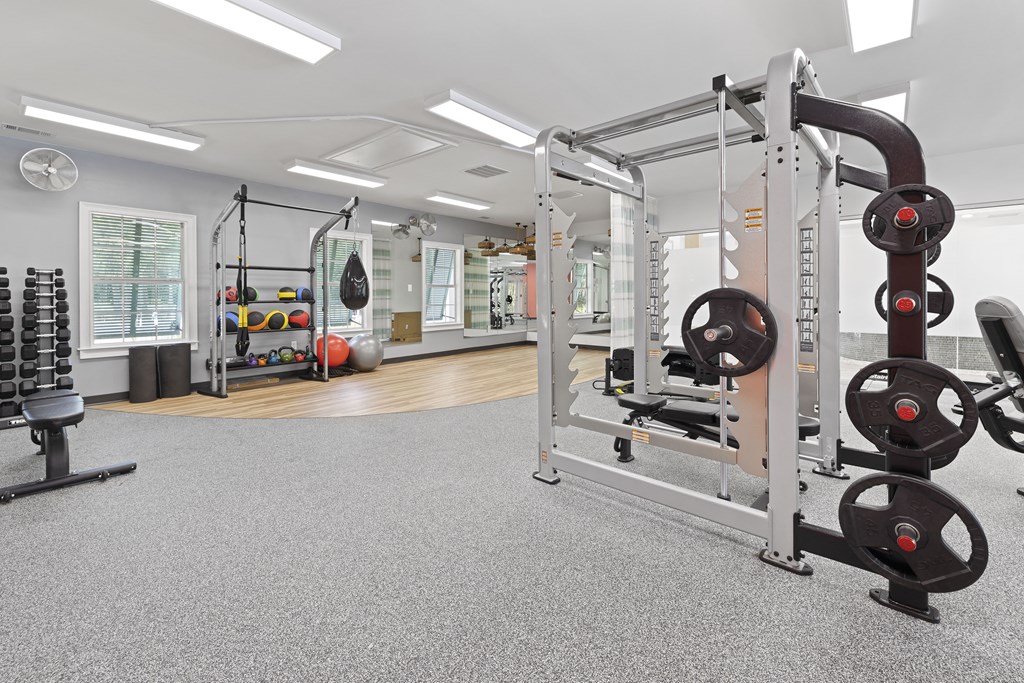 the gym at the enclave at woodbridge apartments in sugar land, tx