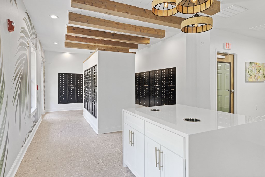 a wine room with white cabinets and white walls