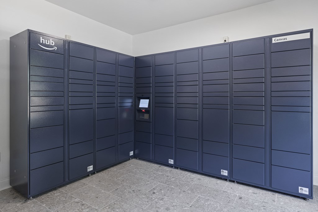 a row of lockers in a room with a tile floor