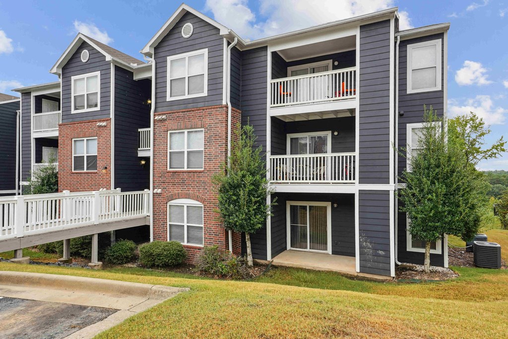 Pet-Friendly Rentals in Little Rock, AR – Capitol Hill – Apartment building with grey and red brick exterior.
