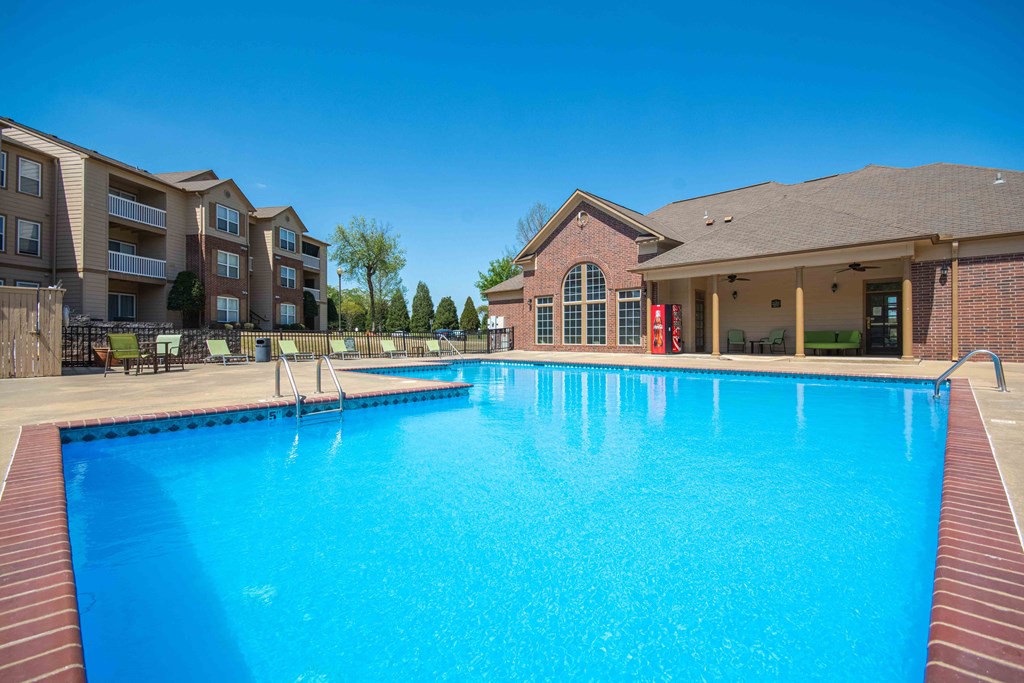 Apartments for Rent in Little Rock, AR 72223– Capitol Hill -   Swimming pool surrounded by club house and apartments