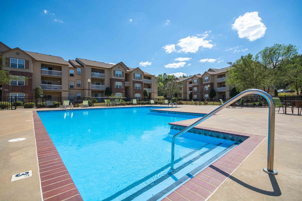 Pet-Friendly Rentals in Little Rock, AR – Capitol Hill – Swimming pool with the apartment complex in the background