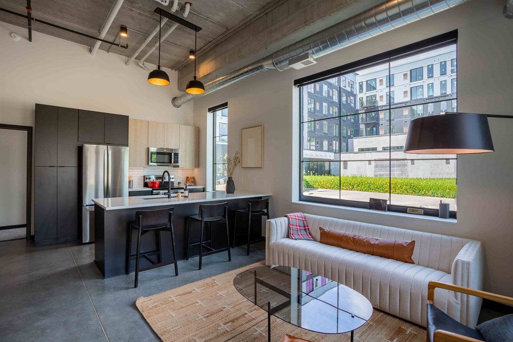 kitchen and living room at the central apartments near downtown minneapolis mn 55408