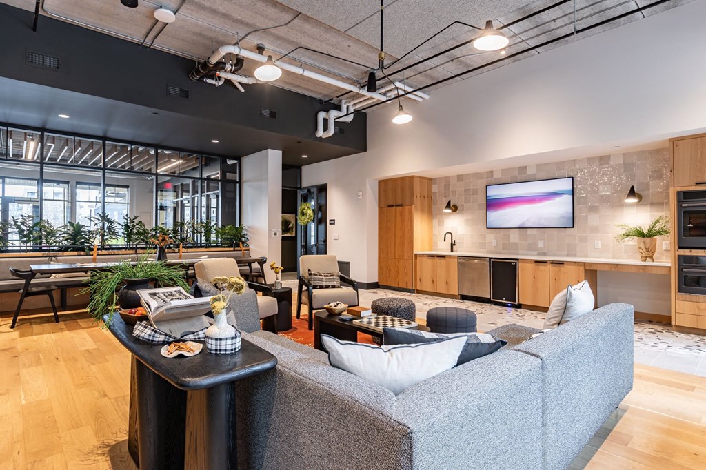 a living room with a couch and a table