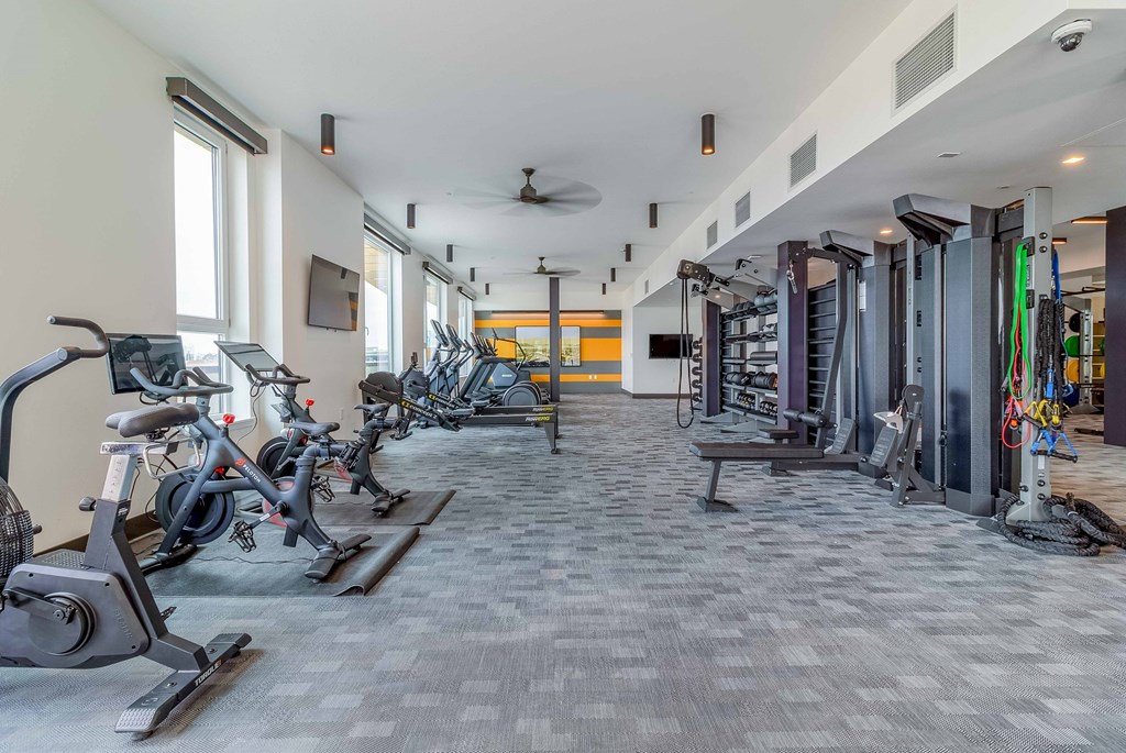 the gym at the flats at big tex apartments