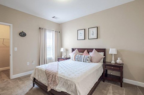 Apartments for Rent in Oak Ridge, TN 37830 – Centennial Village – a bedroom with a bed and two night stands