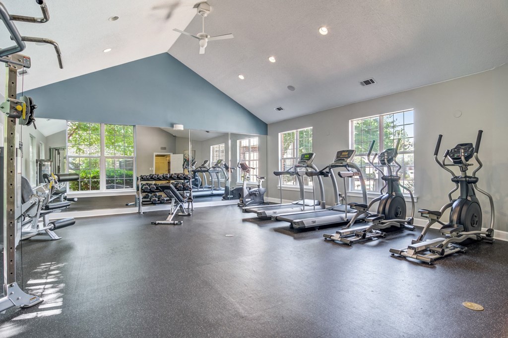 the gym with treadmills and weights at the preserve at greatstone