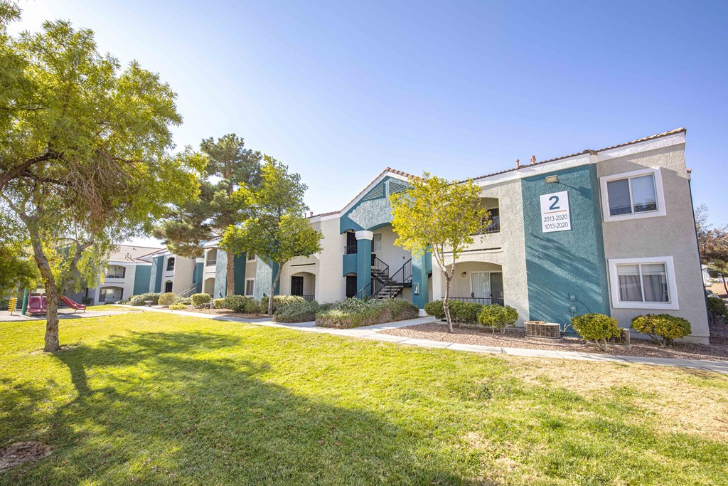 One Bedroom Apartments in Las Vegas, NV - Cimarron Apartments Living Room with Formal Dining Room and Wood-Styled Flooring