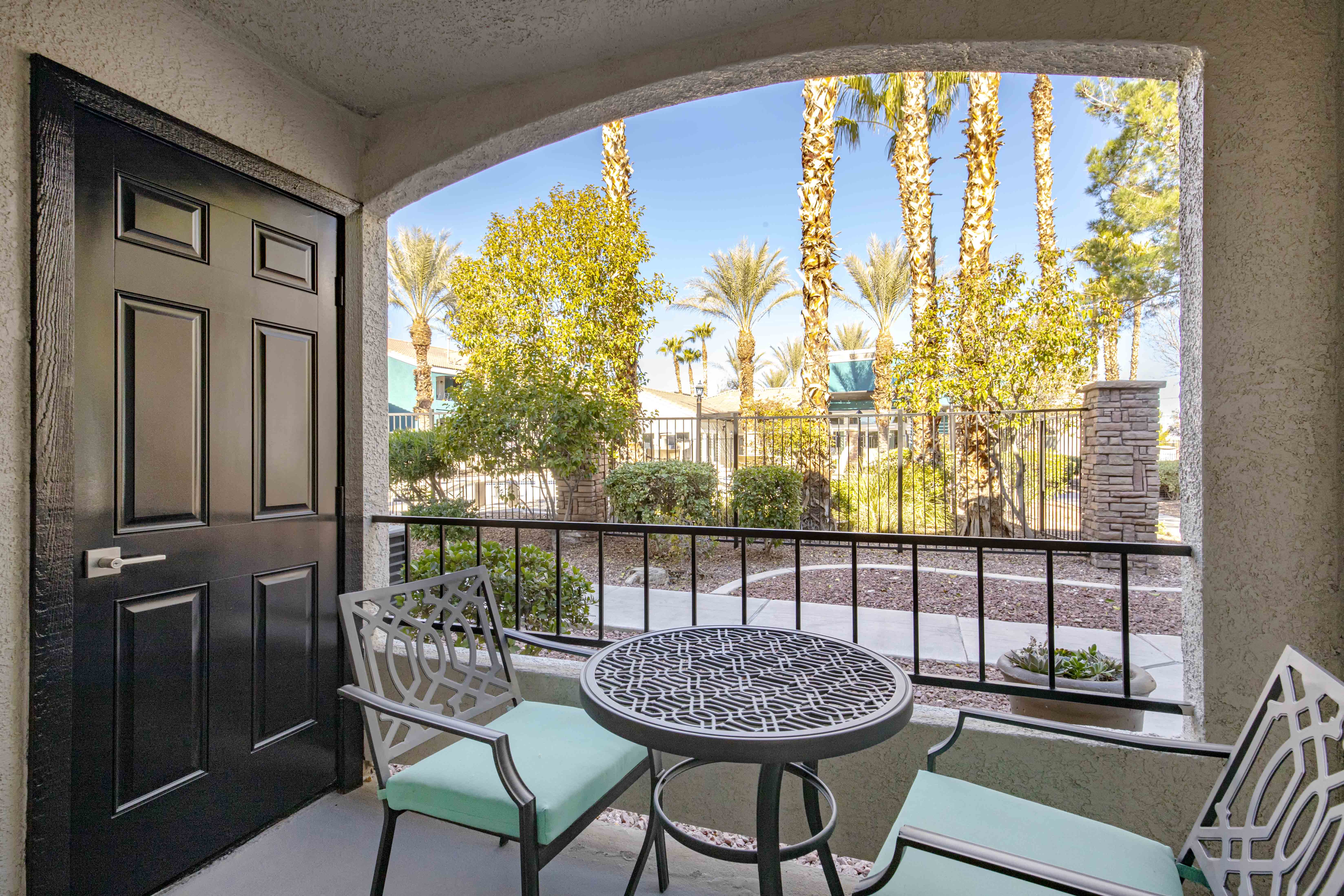 Two Bedroom Apartments in Las Vegas, NV - Cimarron - Private Patio with a Table, Chairs, and Beautiful Views