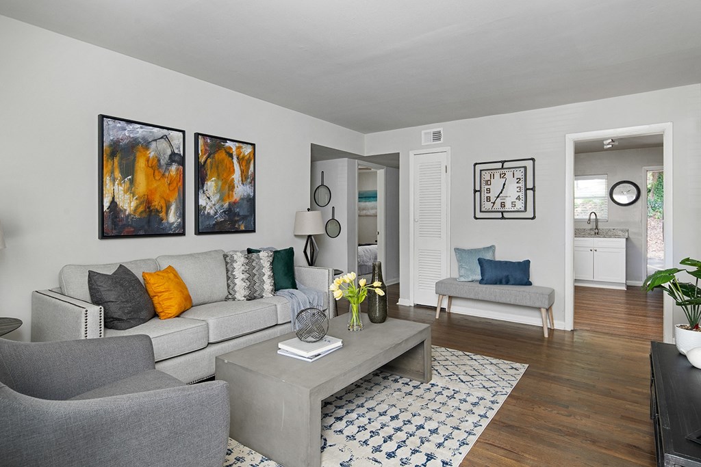 Collier Flats Atlanta GA apartment photo of  living room with hardwood flooring and modern furniture