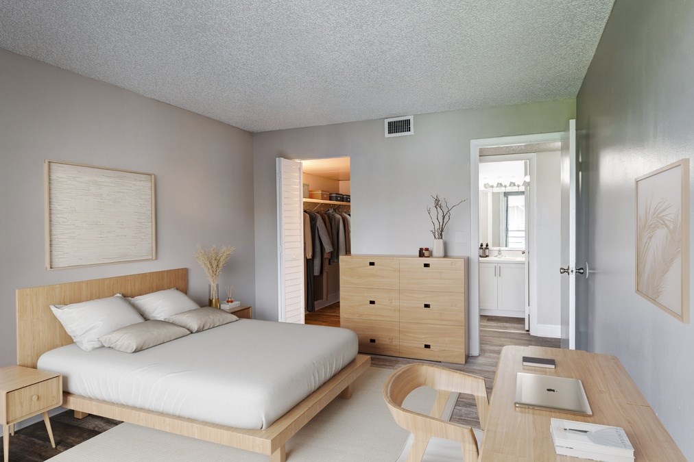 Spacious bedroom with natural light at Coronado Springs Apartments in Palm Springs, FL. Comfortable one- and two-bedroom pet-friendly floor plans