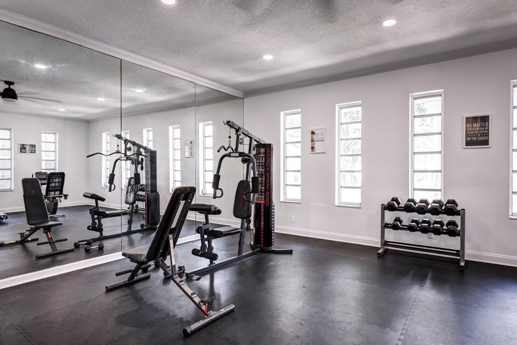 On-site fitness center at Coronado Springs Apartments in Palm Springs, FL, with cardio and strength equipment available to residents in this pet-friendly apartment community