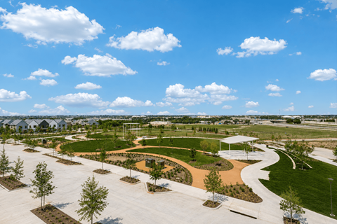 A park with a playground and walking paths.