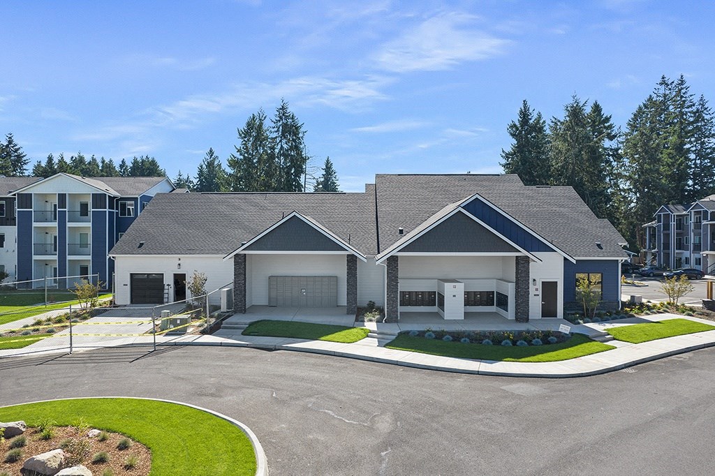 building exterior with mailbox center,