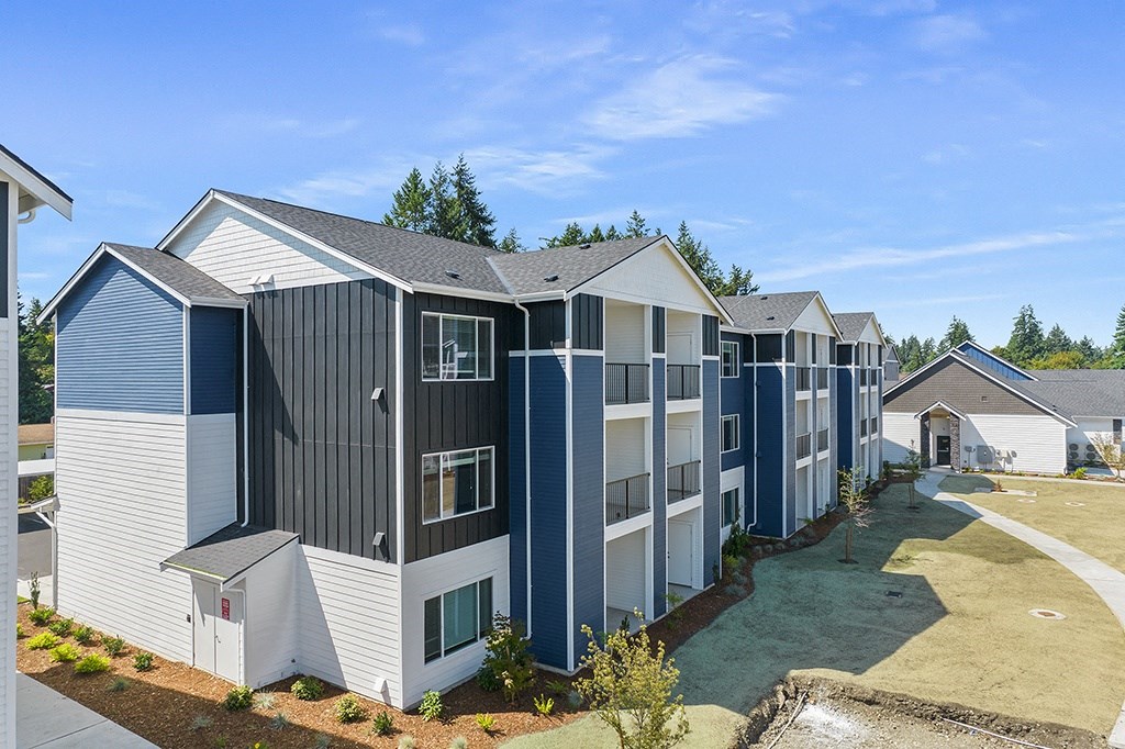 exterior view of a row of apartment buildings,