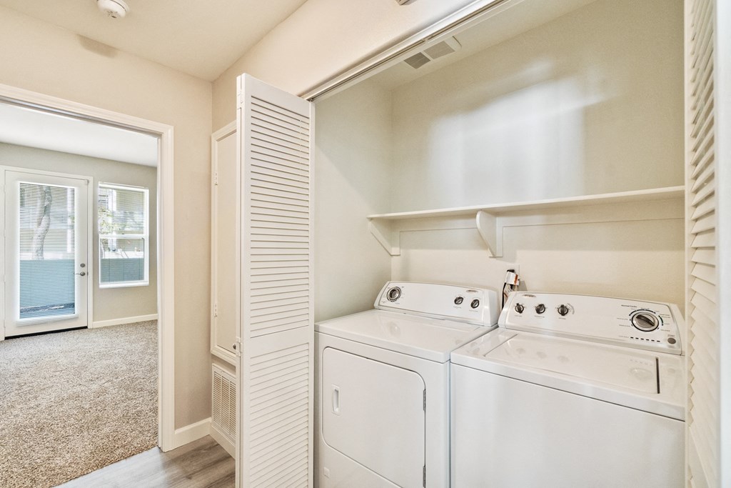 a washer and dryer in the laundry room