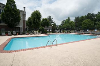 resort style swimming pool with leisure deck at chroma park west