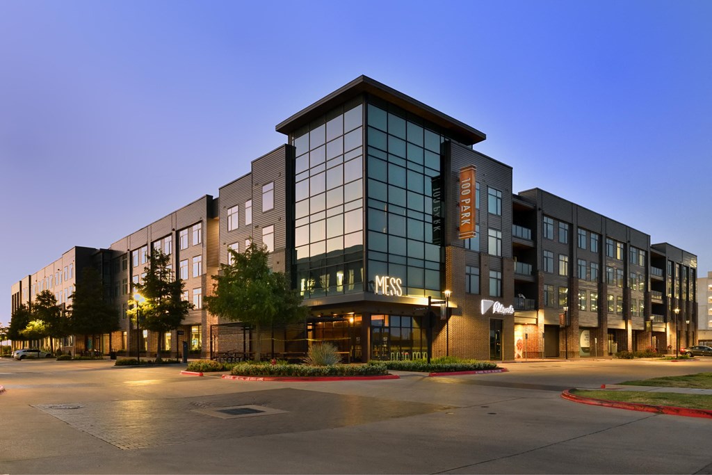 A large, modern building with the word "MERCY" on the front.