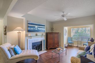 Enclave at Wolfchase Apartments in Cordova Tennessee photo of living room with fireplace