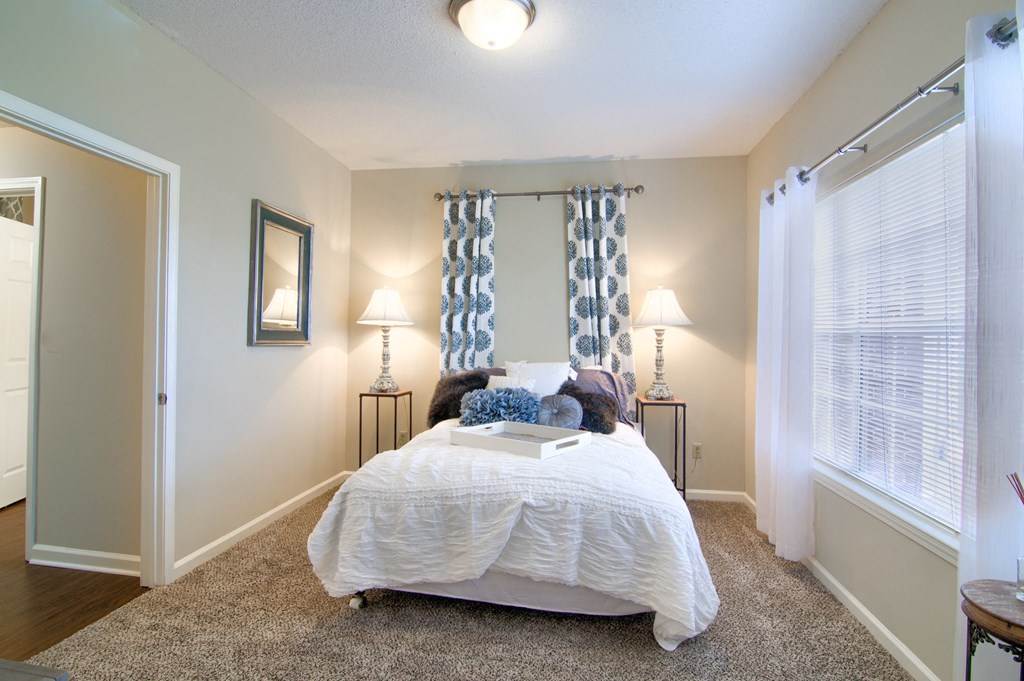 Enclave at Wolfchase Apartments in Cordova Tennessee photo of bedroom with plush carpeting