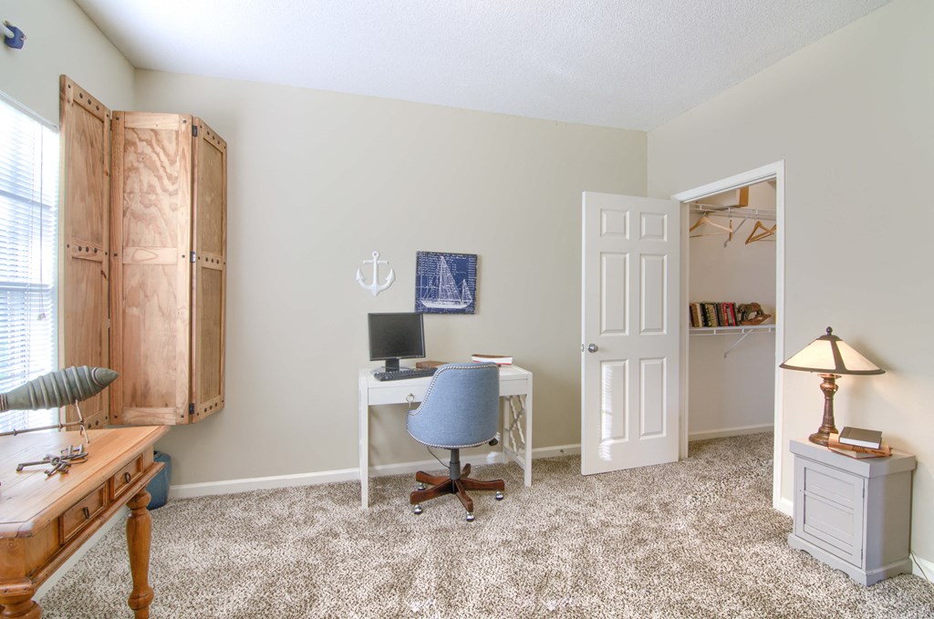 Enclave at Wolfchase Apartments in Cordova Tennessee photo of a home office with a desk and computer