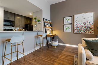 Living Room With Kitchen Living Room With Kitchen at Cosmopolitan Apartments, Saint Paul, MN