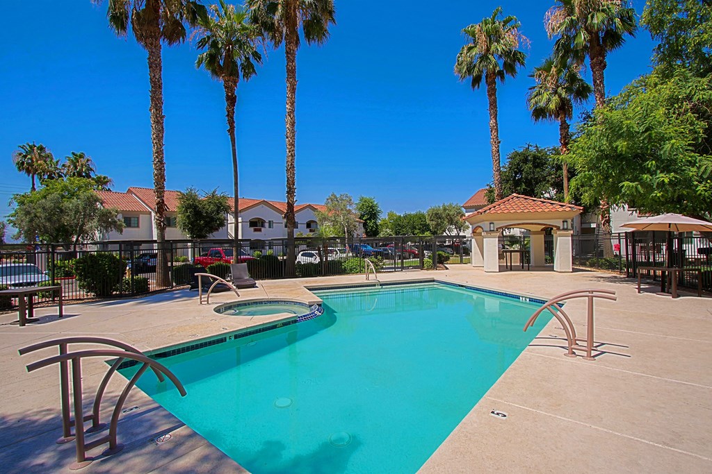 Dog-Friendly Apartments in West Phoenix, AZ - Del Mar - Pool with Spa, Tables, Chairs, Umbrella, and a Gazebo