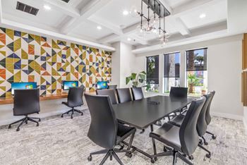 High style E Lounge with conference table and computer stations