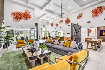 Expansive Resident Club with 20 foot floor to ceiling library