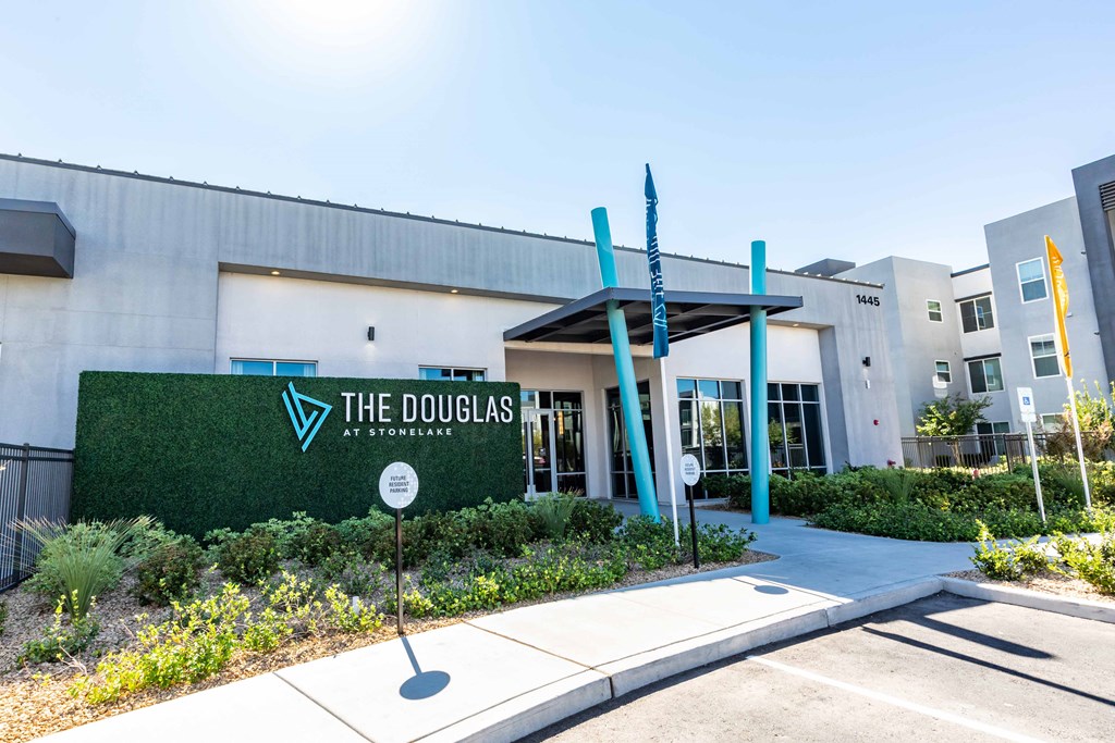 a building with a sign that reads the douglas at headquarters