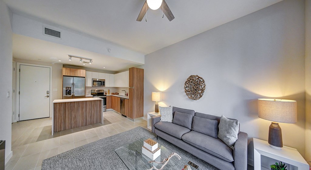 a living room with a couch and a table