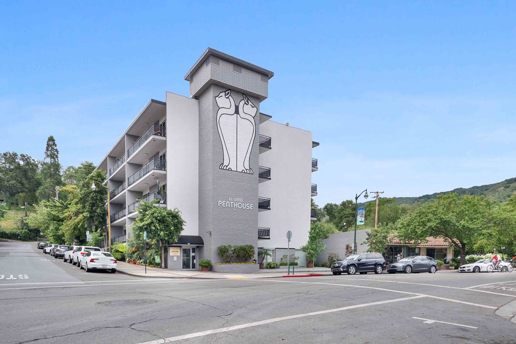 Apartments Los Gatos, CA - El Gato Penthouse - Exterior View of Apartment Building with a Painted Mural of Two Cats.Exterior View of Apartment Building with a Painted Mural of Two Cats
