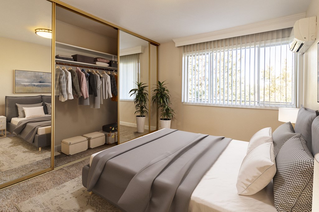 Apartments Near Stanford - Los Gatos, CA - El Gato Penthouse - Bedroom With Plush Carpeting, Spacious Closet With Large Sliding Mirror Doors, A Window For Natural Light, And A/C