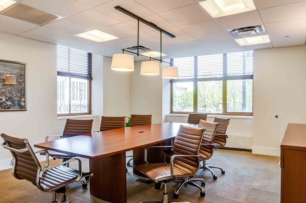 Conference room with table and chairs in light-filled space