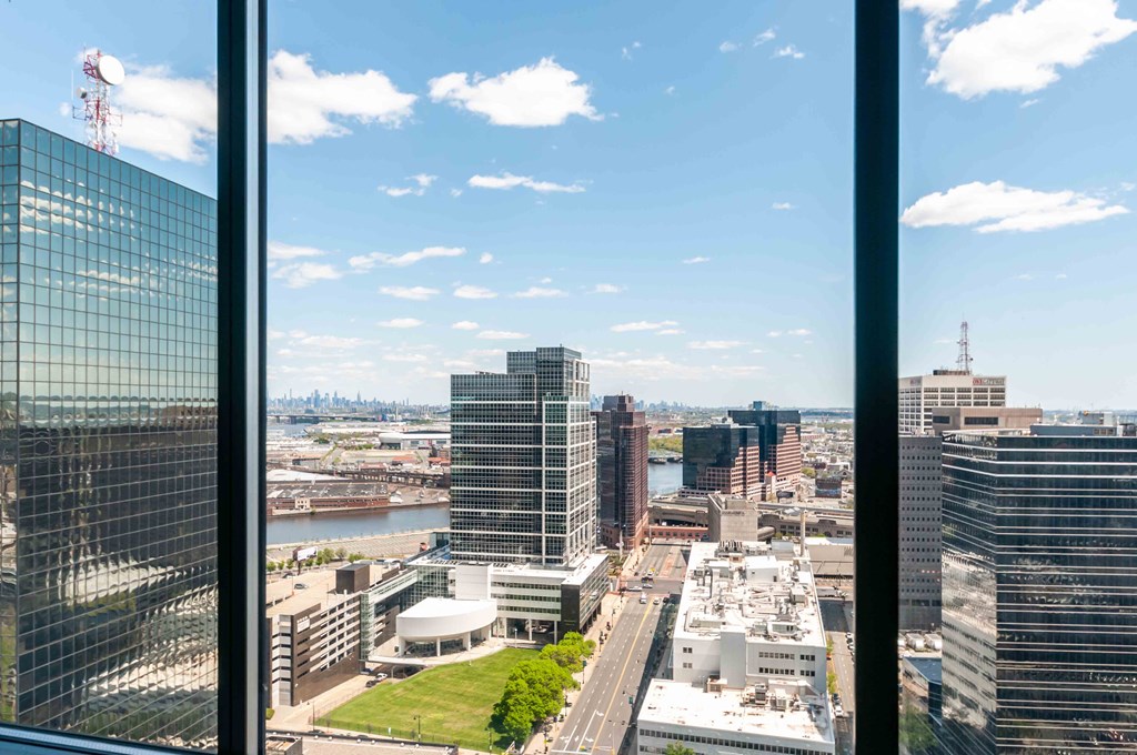 VIew of Newark skyline through apartment window