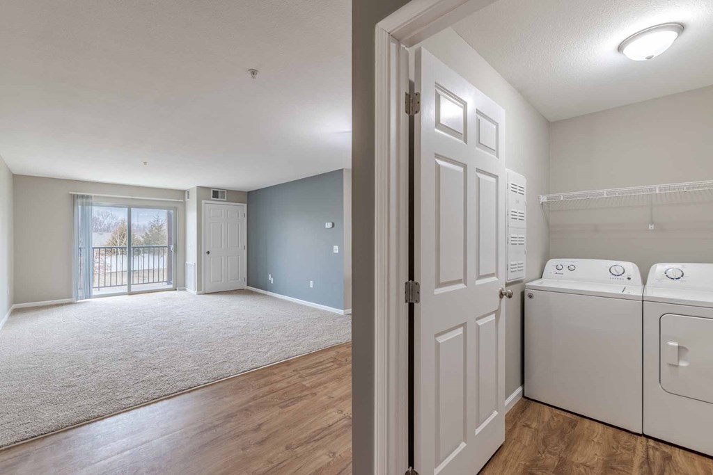 A laundry room with a washer and dryer.