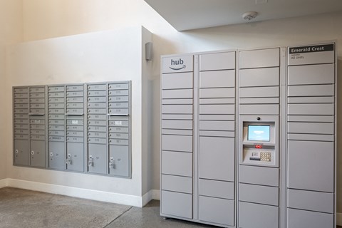 A row of lockers with a sign that says Emerald Crest at Emerald Crest, Bothell, WA 98011