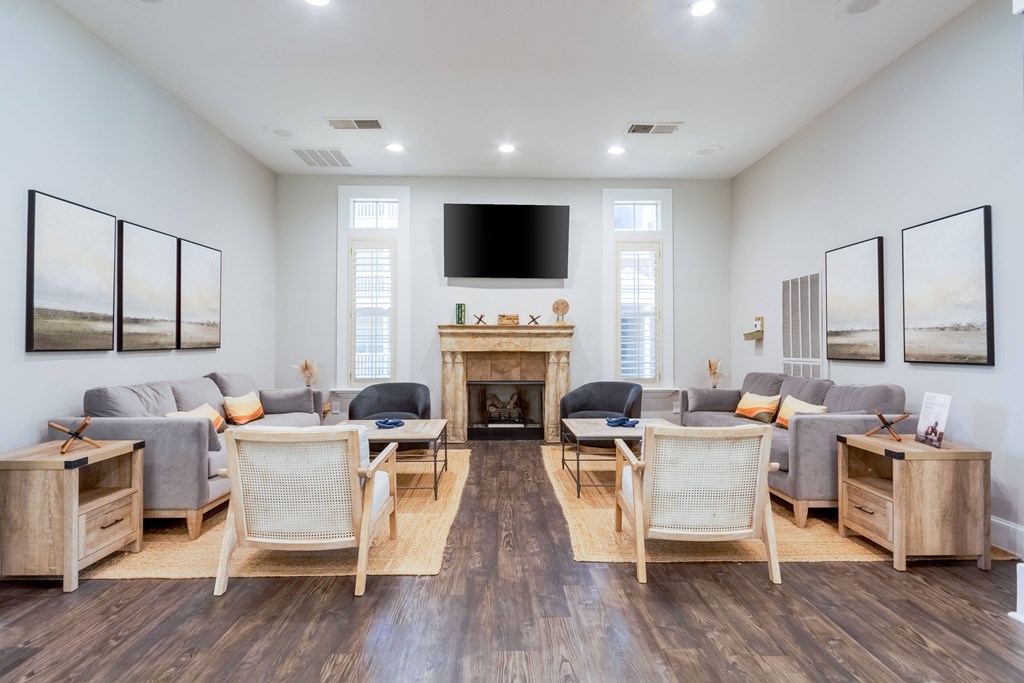 Modern clubhouse sitting area for residents at Enclave at Wolfchase Apartments.