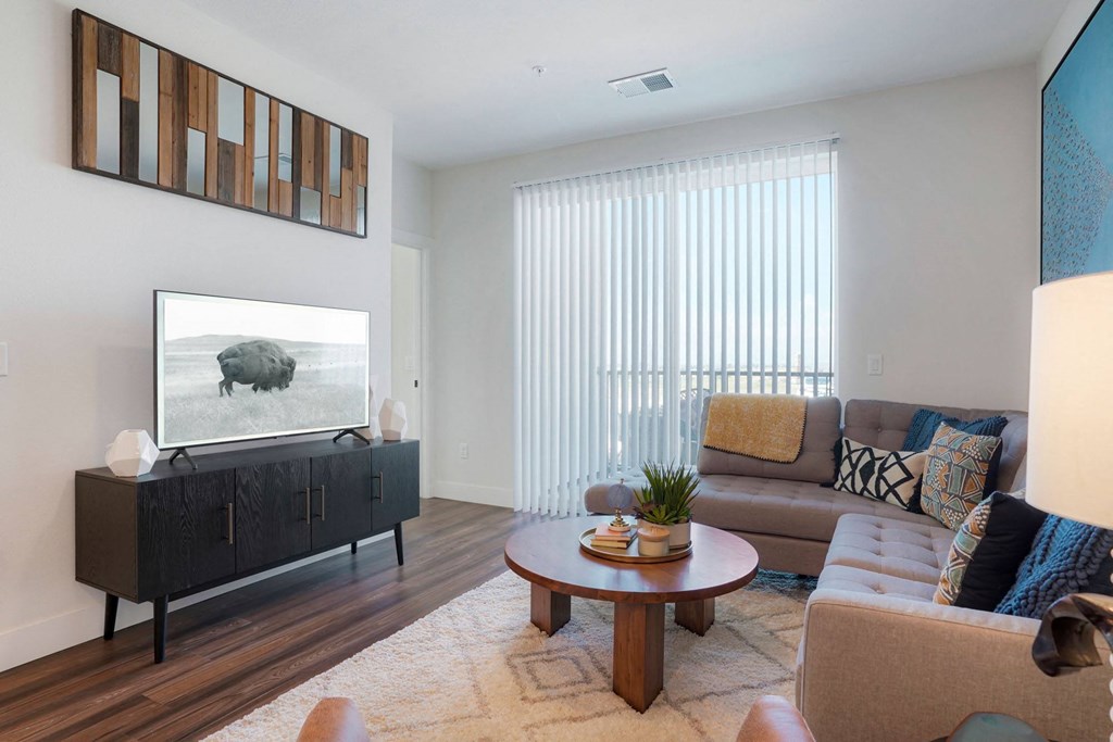 a living room with a couch and a table