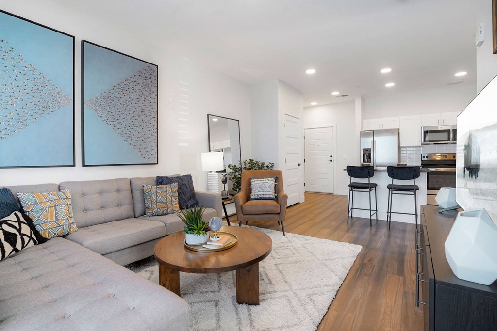 a living room with a couch and a table