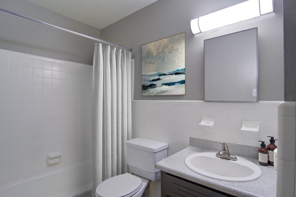 Bathroom with tub and shower combination at Estuary apartments in Atlanta, GA 30341, near Chamblee and Brookhaven