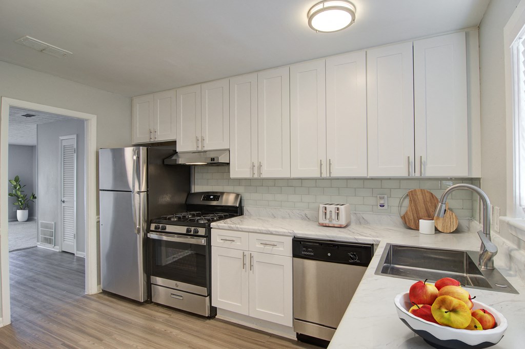 Modern kitchen with stainless steel appliances at Estuary apartments in Atlanta, GA 30341, near Chamblee and Brookhaven.